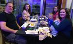 Family of 7 Having Dinner at Sushi Restaurant