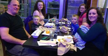 Family of 7 Having Dinner at Sushi Restaurant